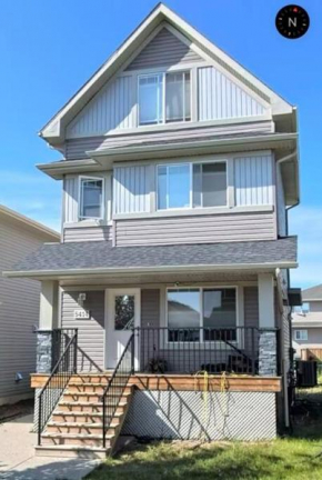 Harbour landing home with 2 living rooms, King bed and 2 car garage